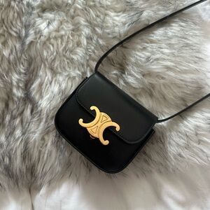 Celine Black and Gold Clutch Sleek Minimalist Design